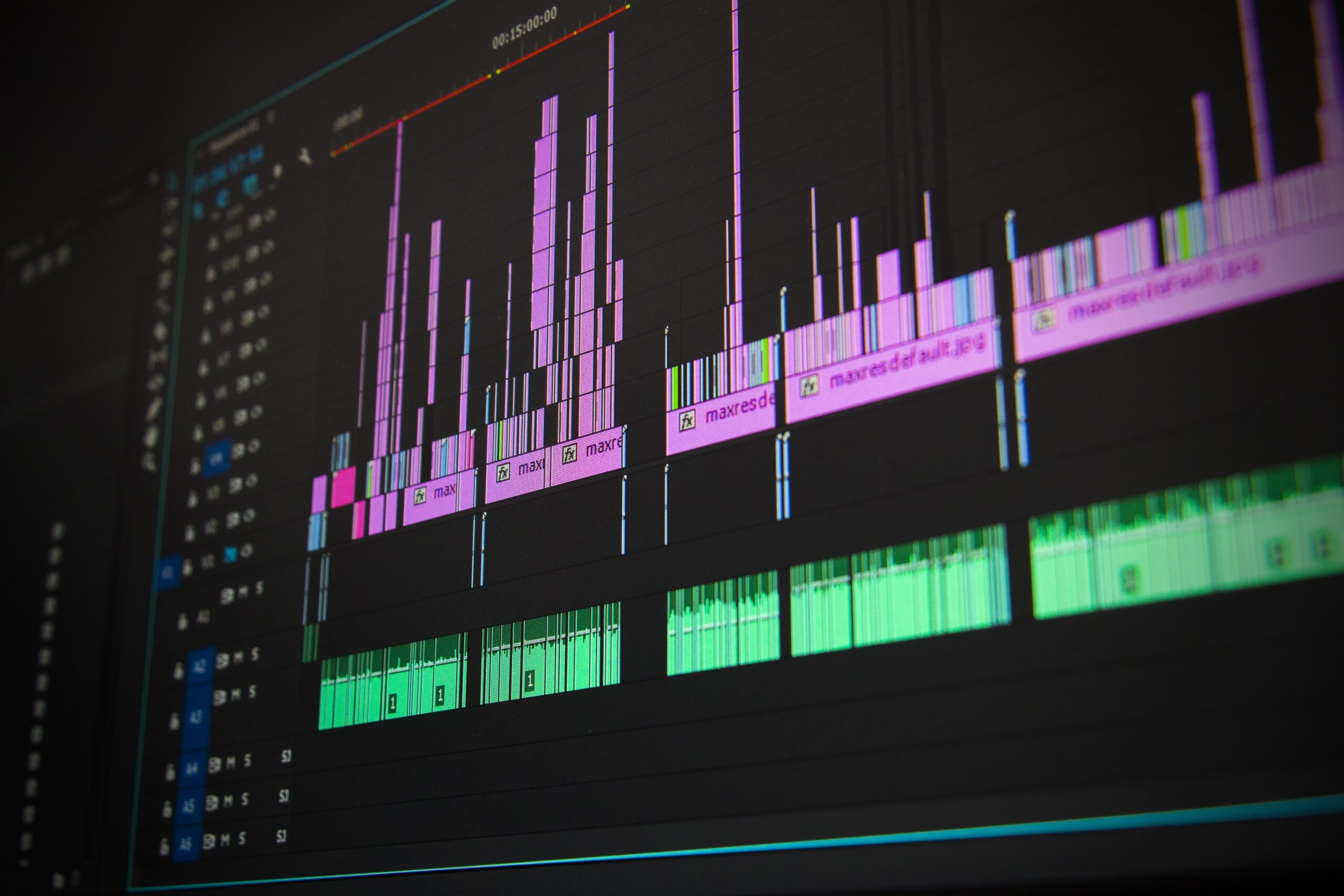 Video editing software with soundwaves and video clips.